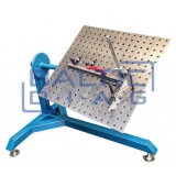 Adjustable position welding table
