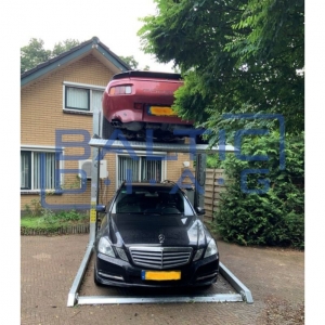 Dviejų kolonų parkingo keltuvas grindiniam šildymui