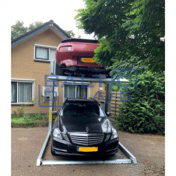 Dviejų kolonų parkingo keltuvas grindiniam šildymui