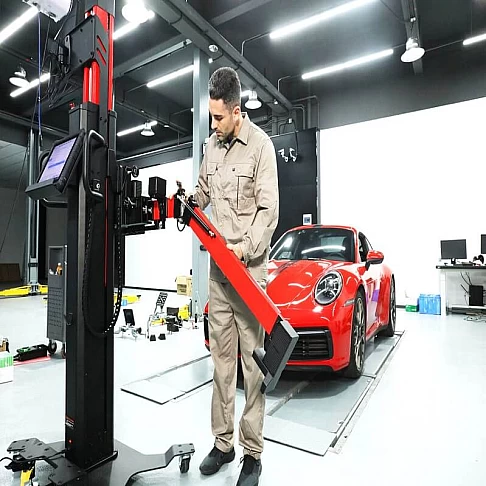 Autel IA900WA wheel alignment stand with rim brackets