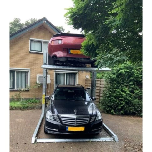 Dviejų kolonų parkingo keltuvas grindiniam šildymui