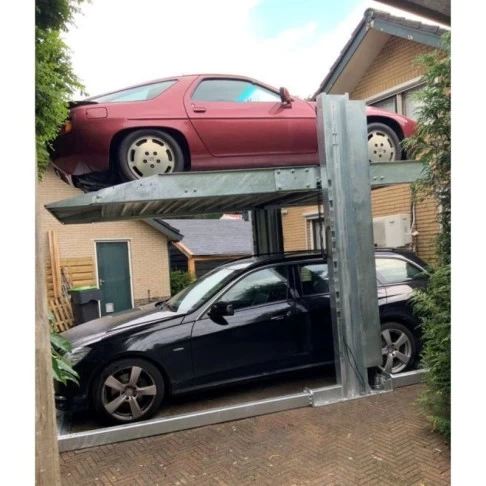 Dviejų kolonų parkingo keltuvas grindiniam šildymui