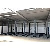 Четырёхстоечный парковочный подъёмник на три автомобиля
