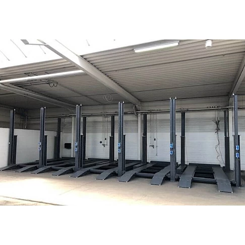 Четырёхстоечный парковочный подъёмник на три автомобиля