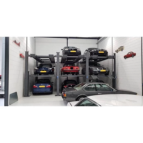 Четырёхстоечный парковочный подъёмник на три автомобиля