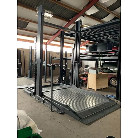 Двухстоечный парковочный подъёмник на три автомобиля